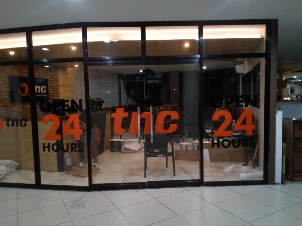 LED and vinyl signage for TNC internet cafe in Makati, displaying OPEN 24 HOURS by M&G Global Ads.