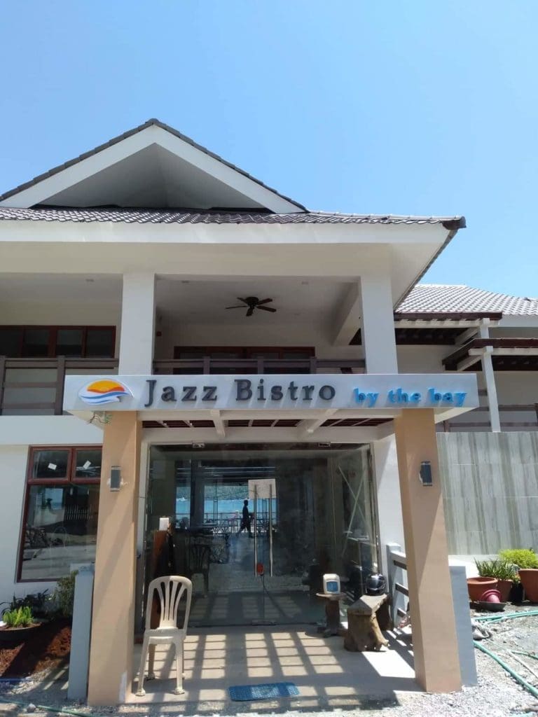 LED outdoor signage for Jazz Bistro by the bay, two-story white building in Makati, by M&G Global Ads.