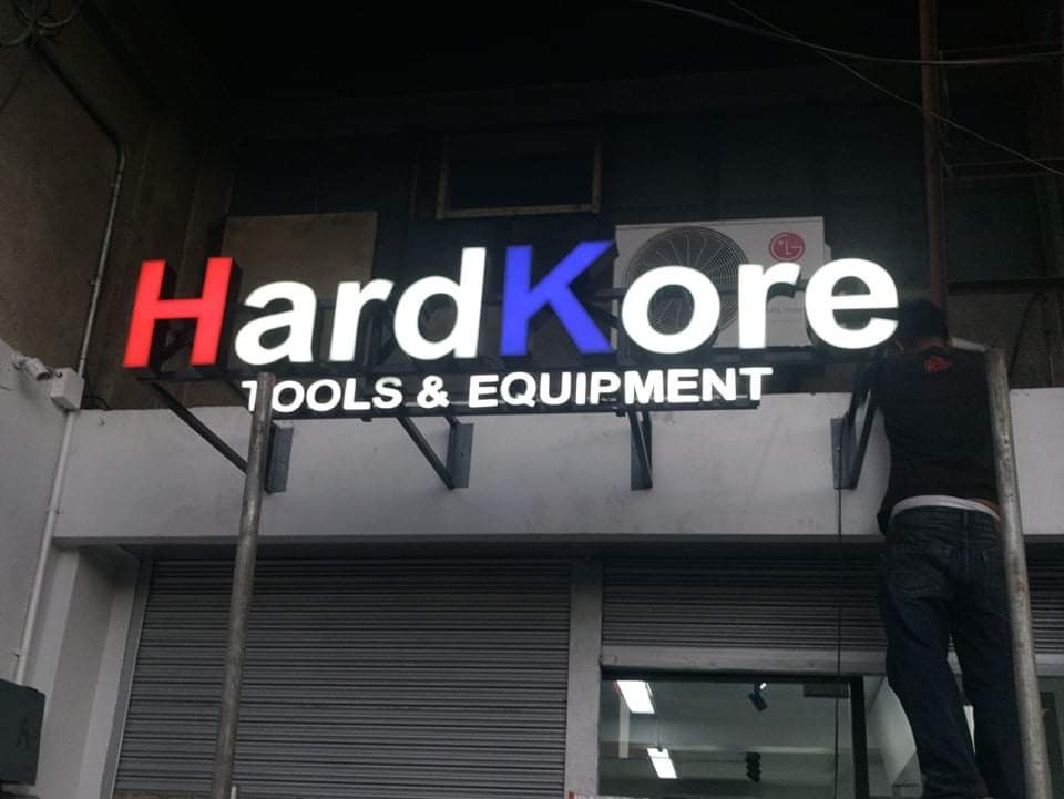 Acrylic building signage for HardKore TOOLS & EQUIPMENT in Quezon City, vibrant colors, by M&G Global Ads.