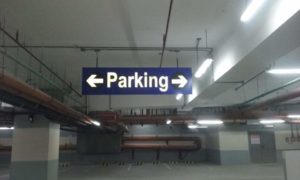 overhead parking signs | directional sign | photoluminescent sign