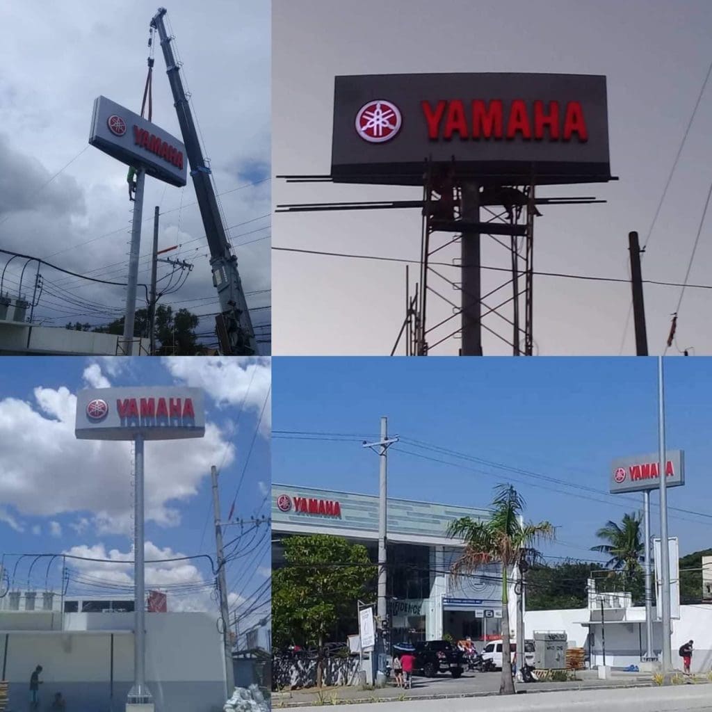 Yamaha pylon signage installation in Quezon City, featuring red logo on white, outdoor display by M&G Global Ads.