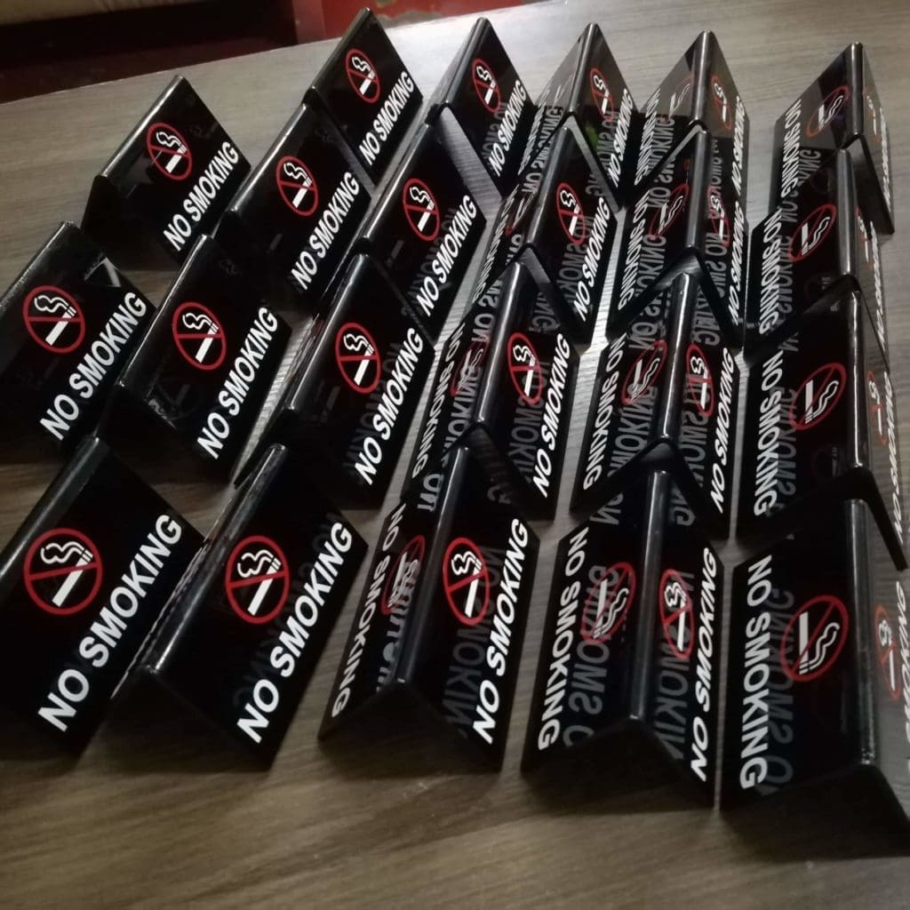 No Smoking table signage for restaurants in Makati, black acrylic with red no-smoking symbol, by M&G Global Ads.