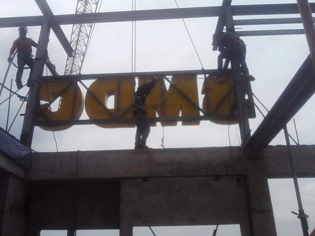 LED signage installation for CMD client on a building under construction in Ortigas by M&G Global Ads.