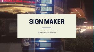 sign maker making signages