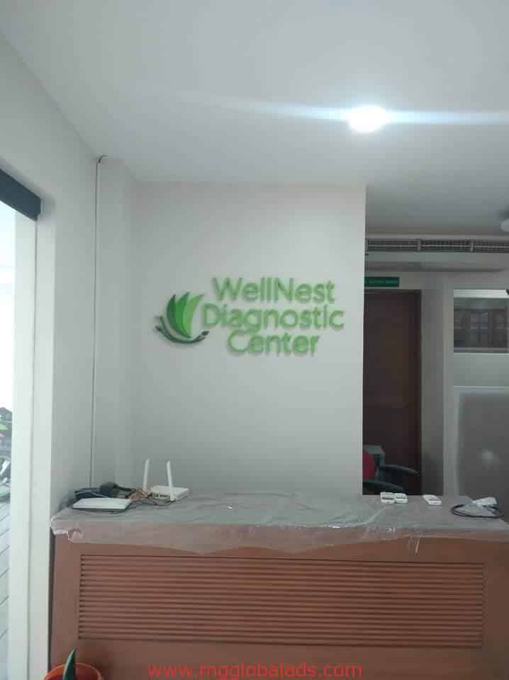 acrylic sign | signages | wellnest diagnostic