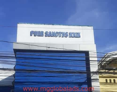 Puer Sanctus| building signage | sign maker