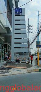 pylon post | building sign | MG Tower