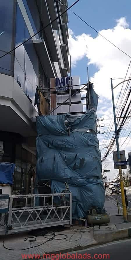 sign maker | building sign | MG Tower