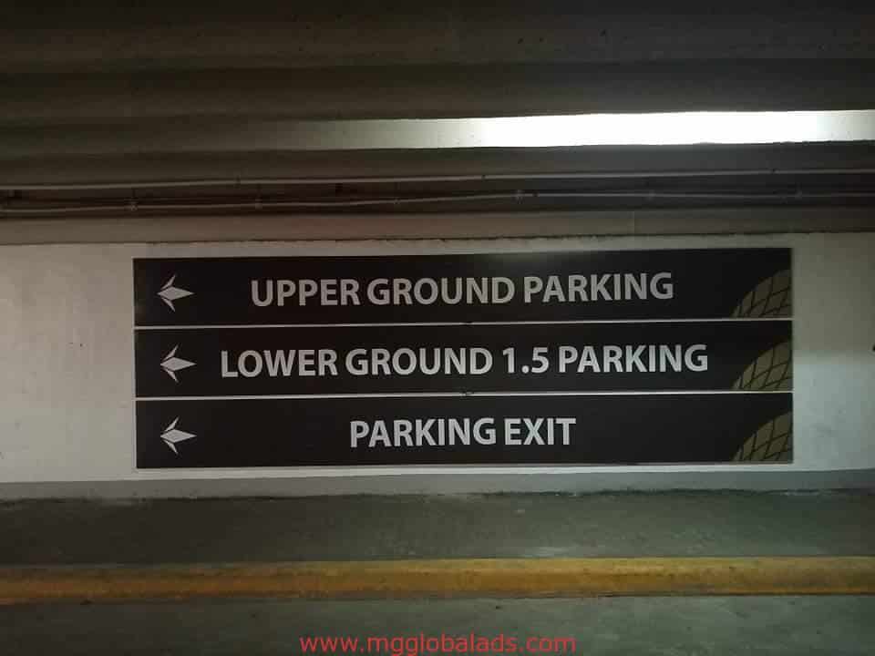 parking sign | directional sign