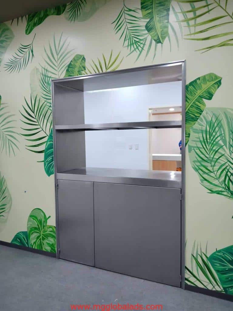 Acrylic signage for cafe with stainless steel pass-through window, tropical leaf wall, in Makati by M&G Global Ads.