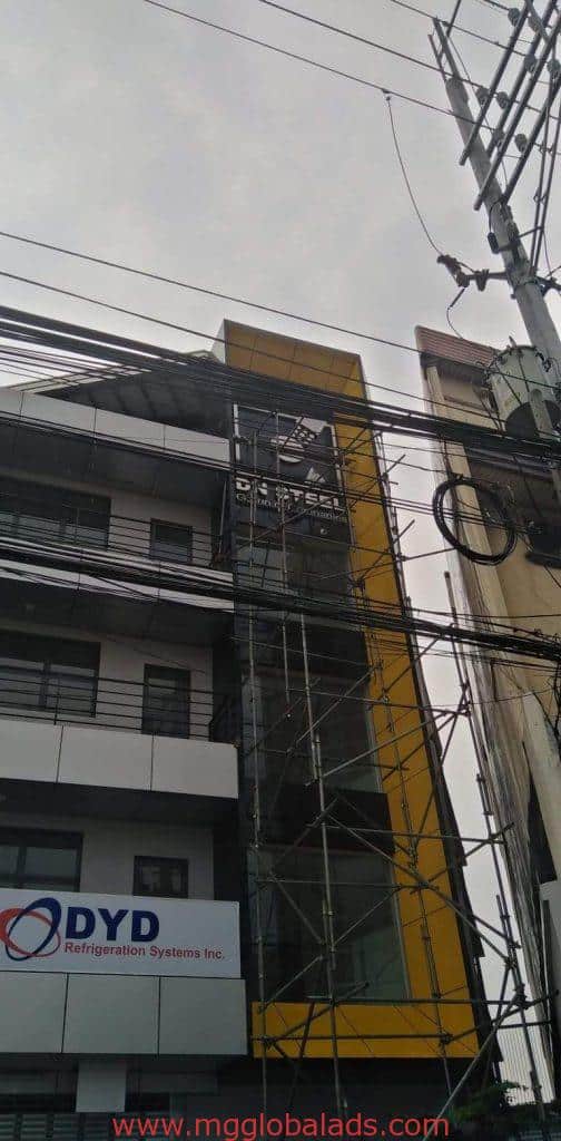 DYD Refrigeration Systems Inc. 3D building signage in Mandaluyong with scaffolding by M&G Global Ads.