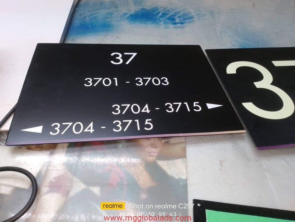 Building room number signage for 37, 3701-3703, and 3704-3715 with arrows in Makati by M&G Global Ads.
