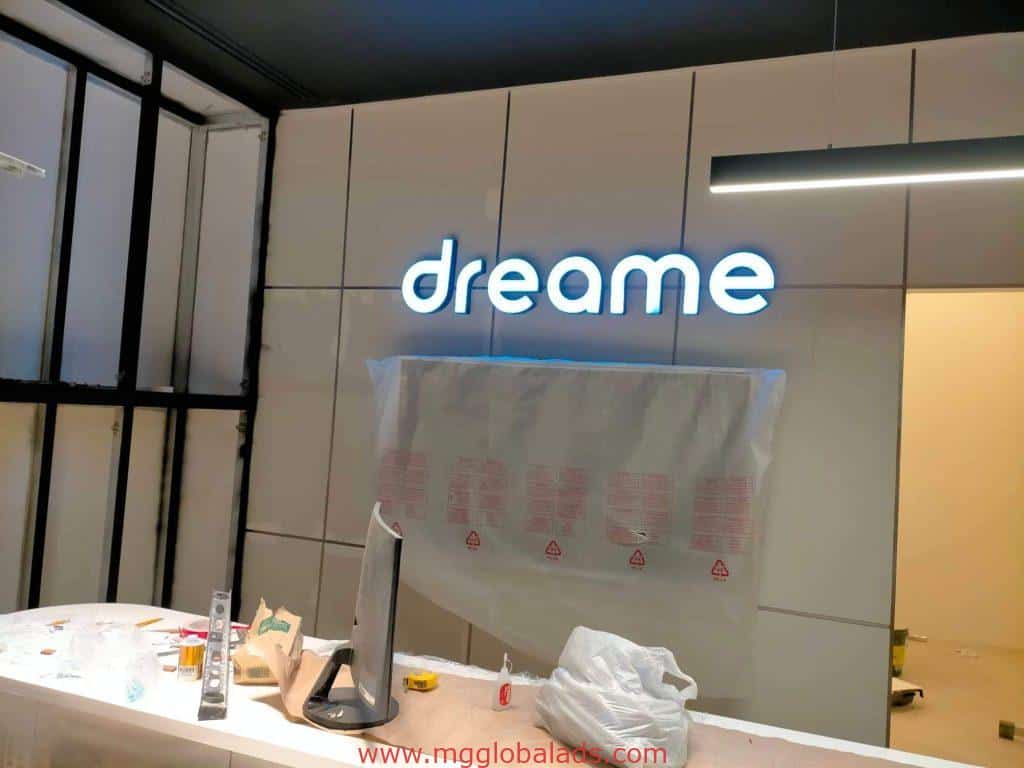 White LED signage for dreame on a tiled wall in Mandaluyong, renovation underway, by M&G Global Ads.