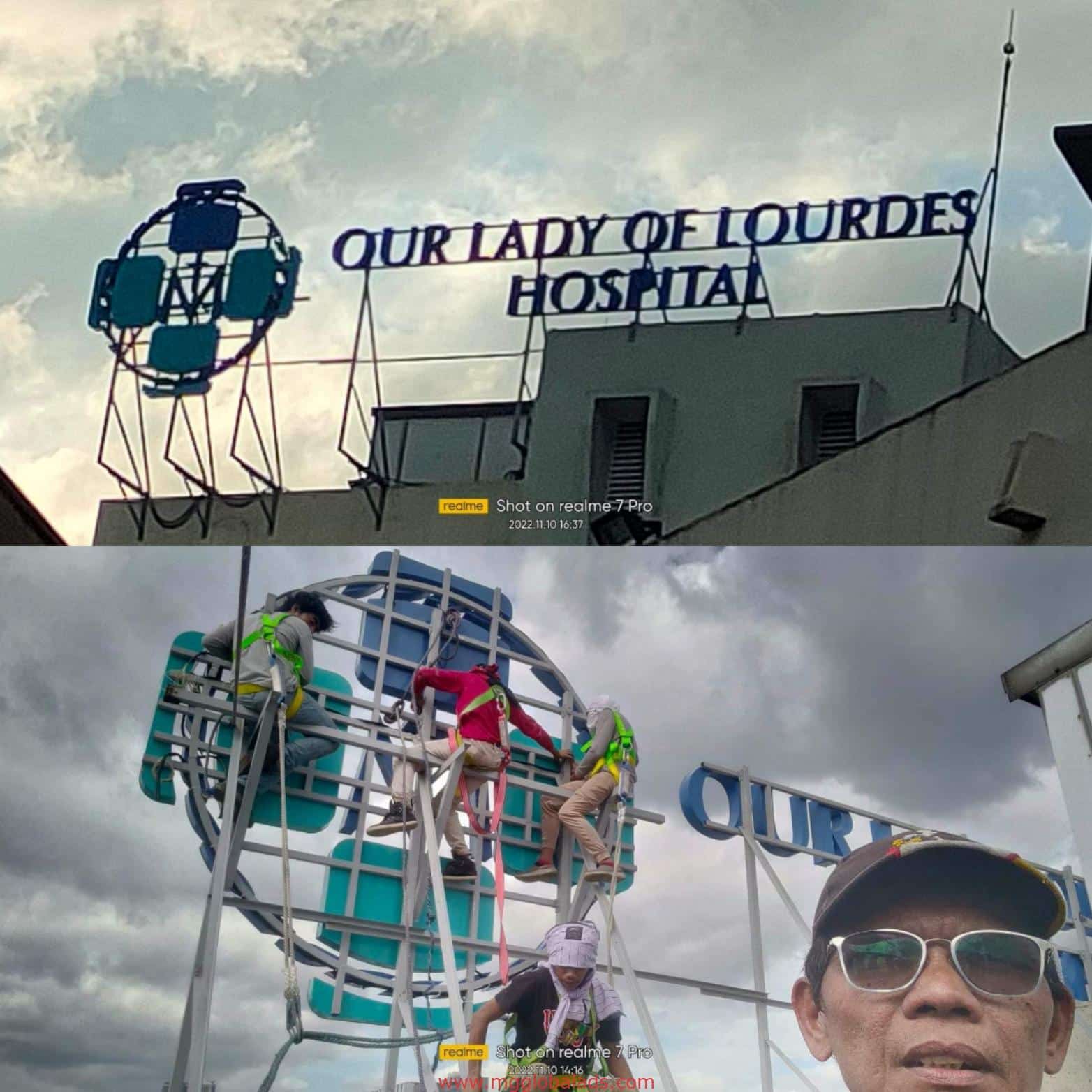 Hospital rooftop LED signage for Our Lady of Lourdes Hospital in Quezon City; workers repair the sign—by M&G Global Ads.