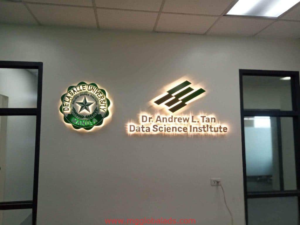 Illuminated acrylic indoor signage for De La Salle University in Makati, showing the Dr. Andrew L. Tan Data Science Institute by M&G Global Ads.