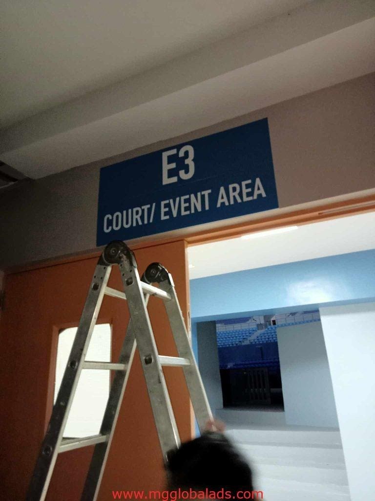 Blue acrylic event venue signage for E3 Court/Event Area at an indoor sports venue in Mandaluyong by M&G Global Ads.
