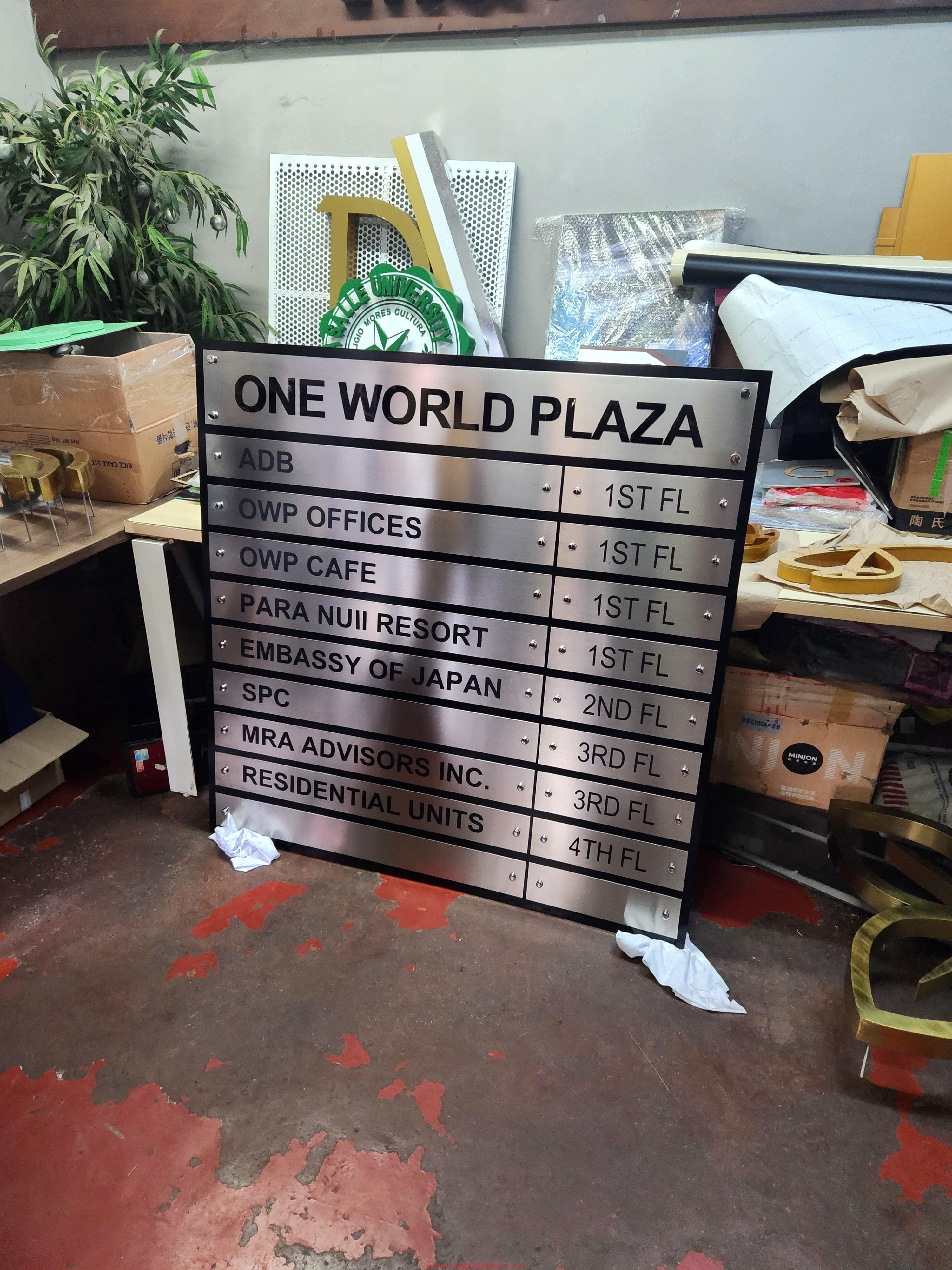 Indoor directory signage for One World Plaza offices in Makati with listed floors, by M&G Global Ads.