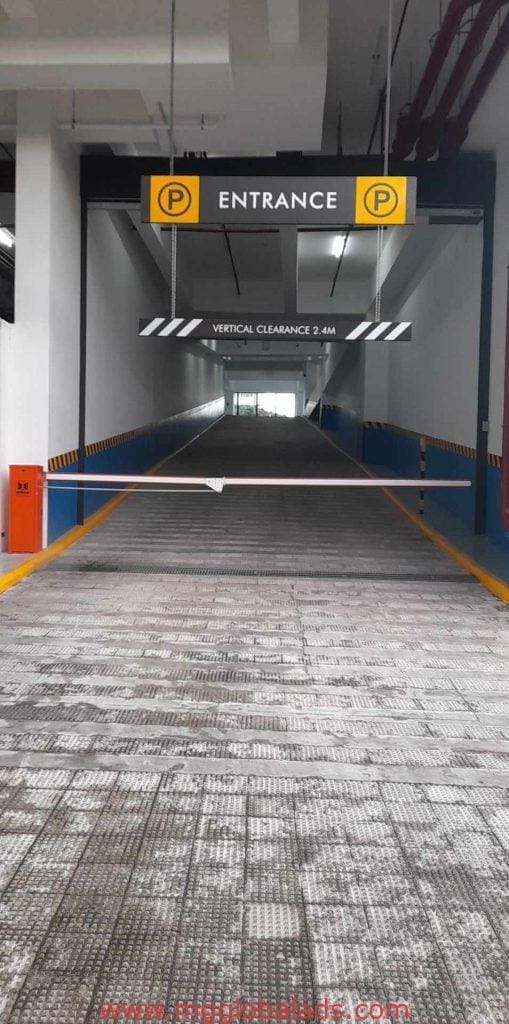 Indoor parking garage entrance with yellow LED entrance signage, 2.4m clearance in Makati, by M&G Global Ads.