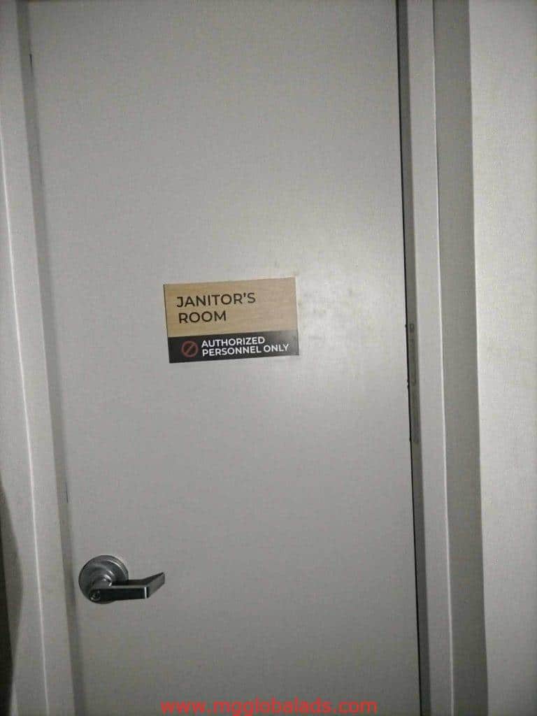 Indoor janitor room door signage with AUTHORIZED PERSONNEL ONLY and no-entry symbol, Makati. By M&G Global Ads.