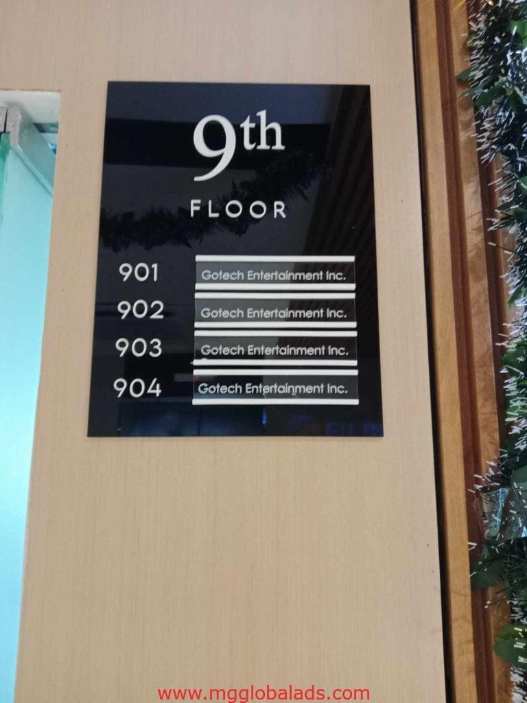 Building directory signage for Gotech Entertainment Inc., rooms 901-904, in Makati, wall-mounted beside plants by M&G Global Ads.