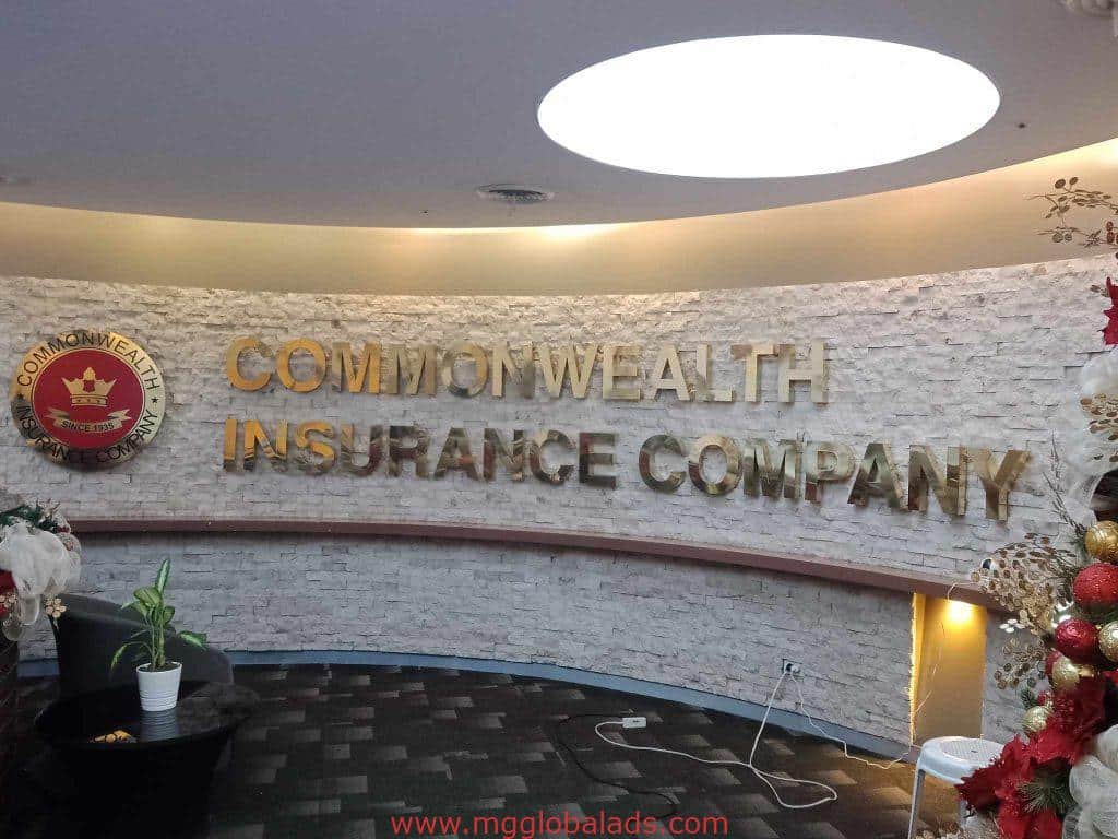 commonwealth insurance | brass signage