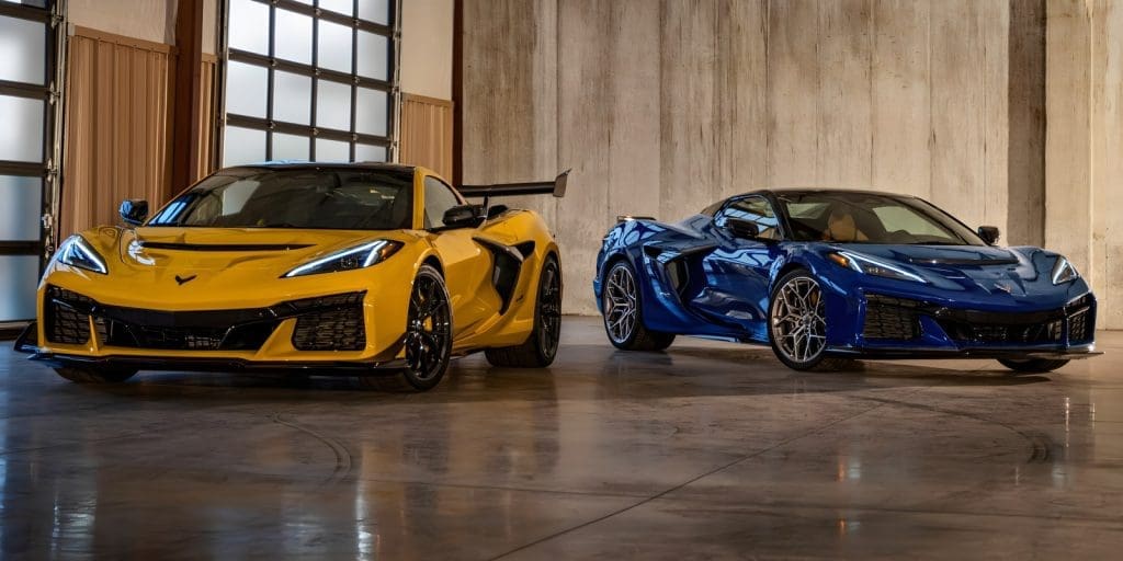 Acrylic signage display with two Chevrolet Corvettes, yellow and blue, indoors in Makati by M&G Global Ads.