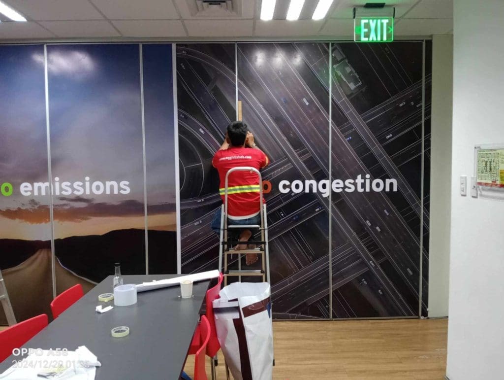 Wall mural installation and LED signage for client in Makati, showing “No emissions” and “No congestion,” by M&G Global Ads.