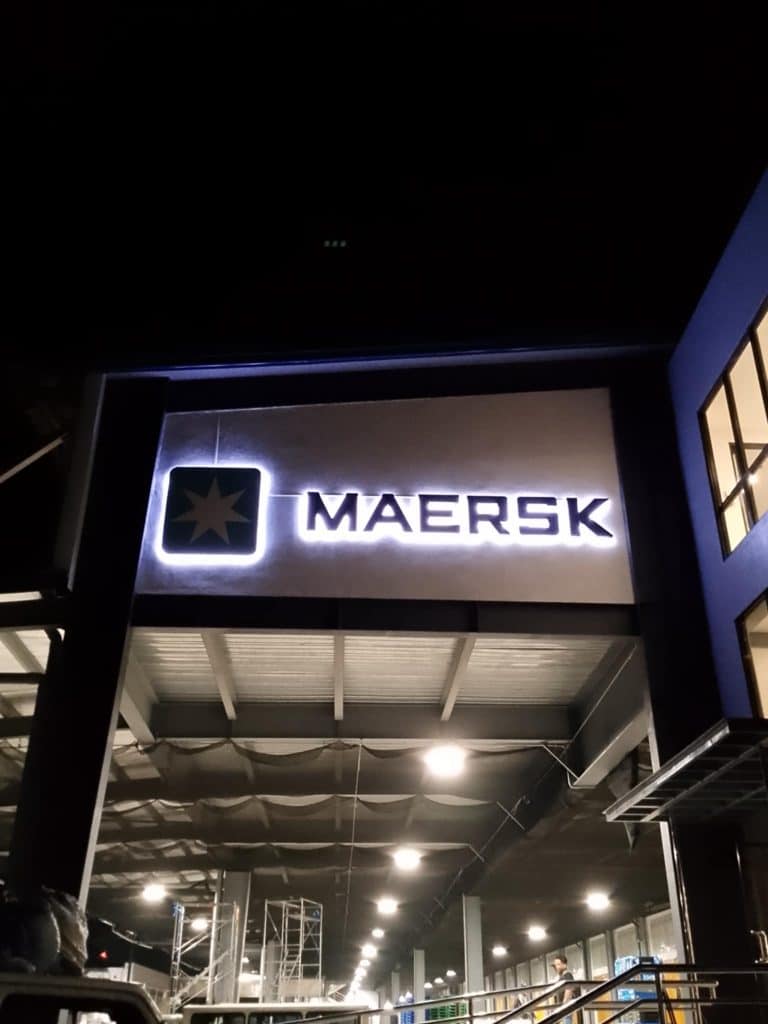 Maersk acrylic signage with logo lit up on a building at night in Ortigas, Metro Manila, by M&G Global Ads.