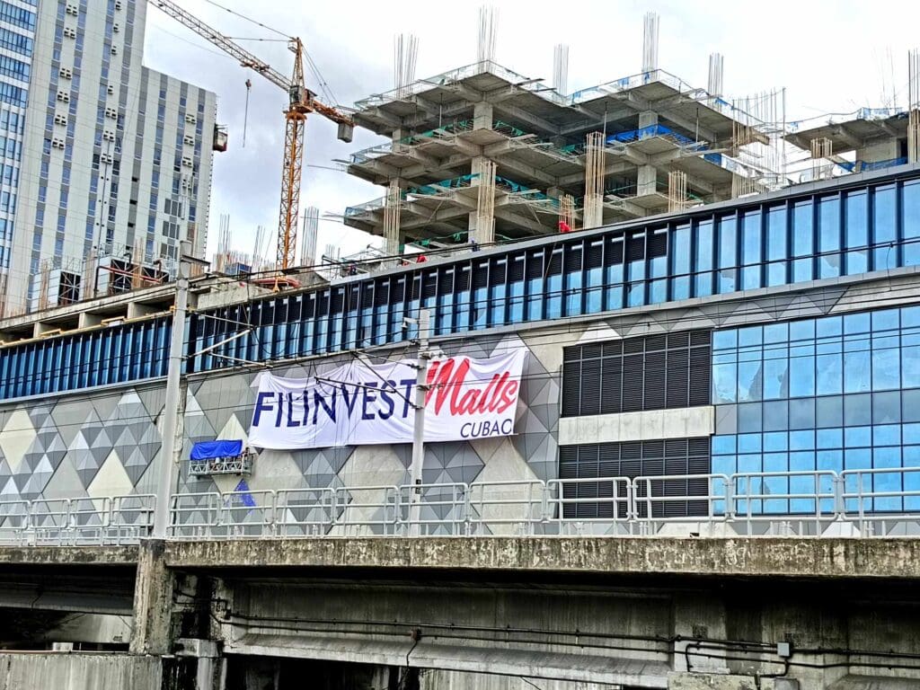 Billboard signage for Filinvest Malls CUBAO on construction site, Quezon City, by M&G Global Ads.