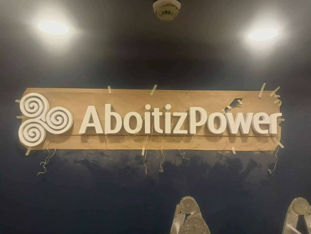 AboitizPower acrylic indoor illuminated signage, wooden mount, Metro Manila sign maker Philippines by M&G Global Ads.