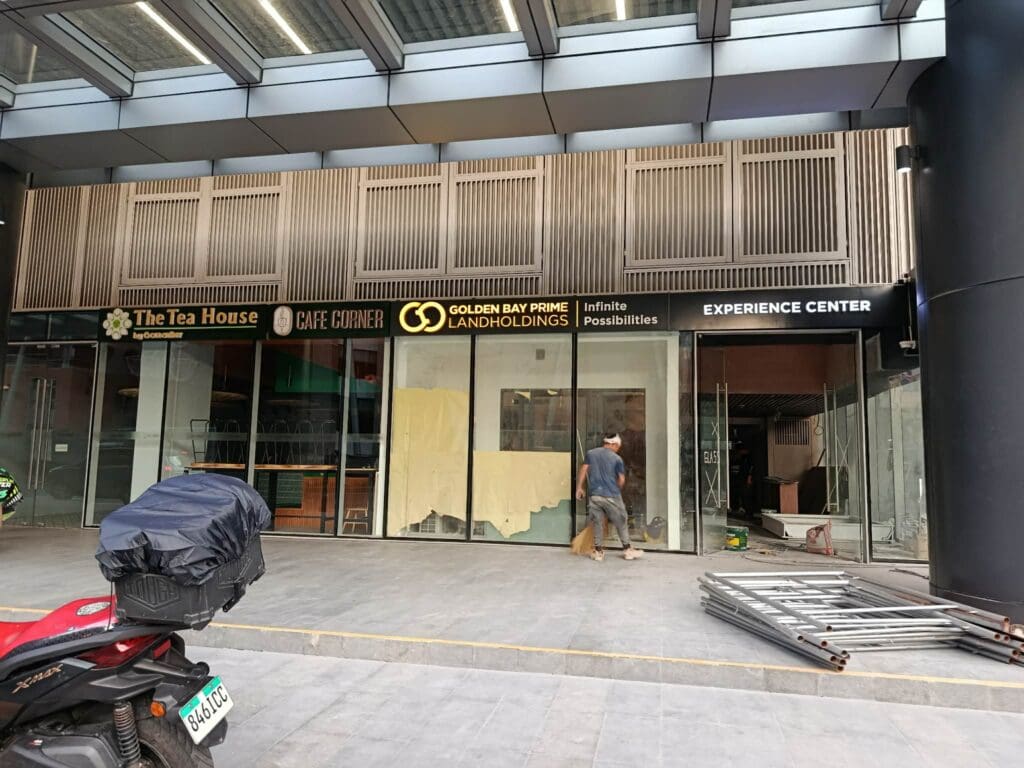 Acrylic building signage for The Tea House, Cafe Corner, Golden Bay Prime Landholdings—storefront in Metro Manila by sign maker Philippines by M&G Global Ads.