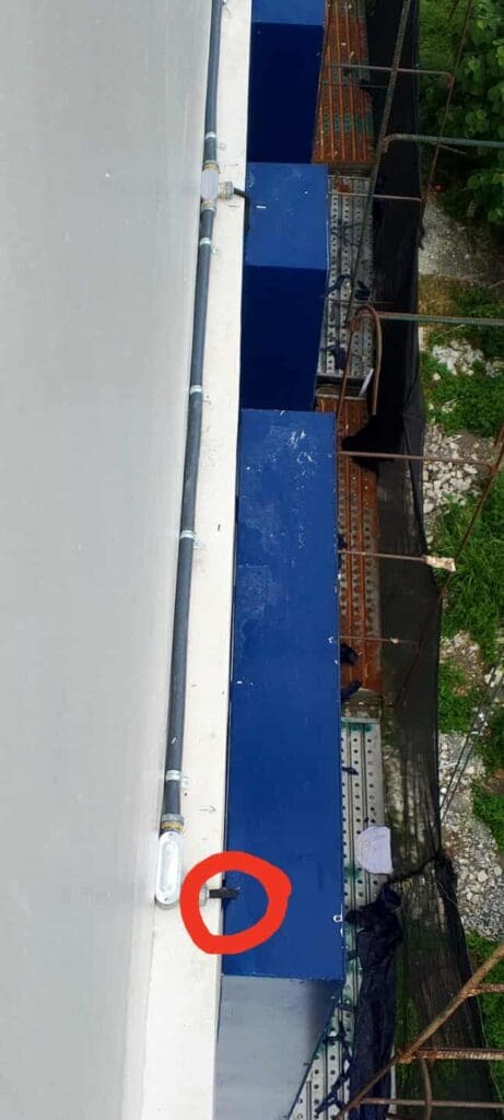 Acrylic building signage with blue metal frame, white facade, Metro Manila, sign maker Philippines by M&G Global Ads.