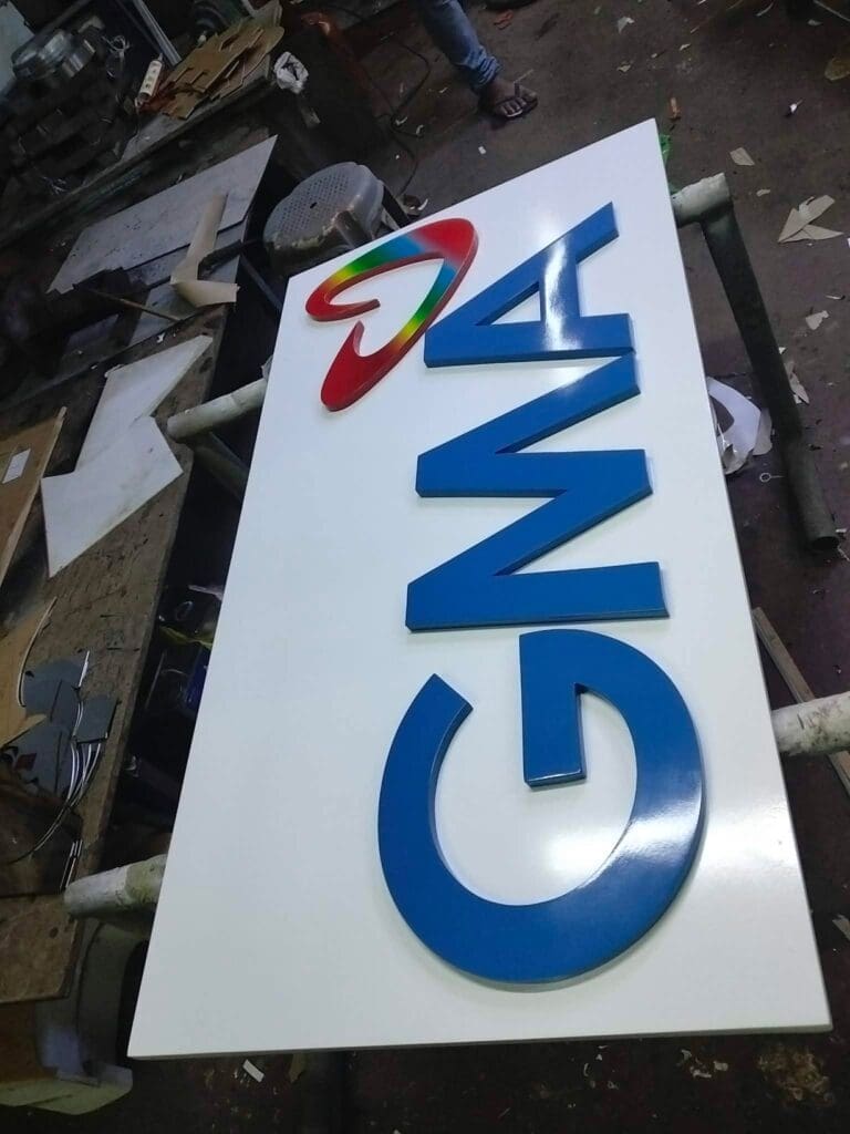Acrylic indoor sign for GMA with colorful heart logo, made by sign maker Philippines, Metro Manila, by M&G Global Ads.