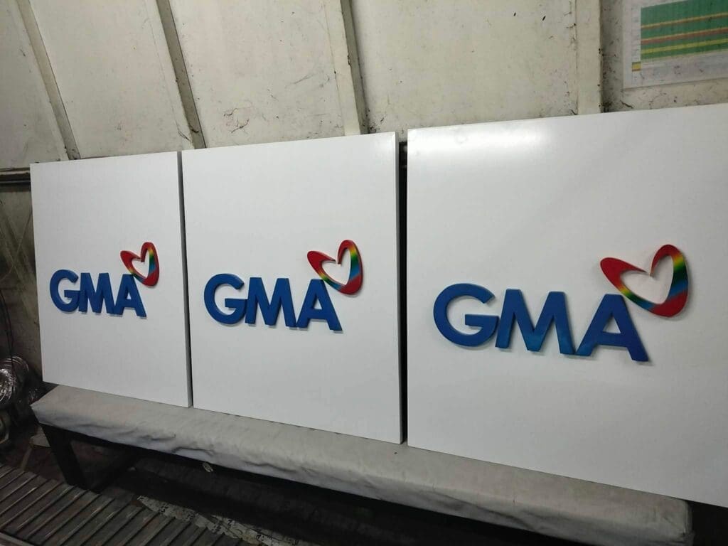 Acrylic indoor signage panels with GMA logo, Metro Manila, by sign maker Philippines M&G Global Ads.