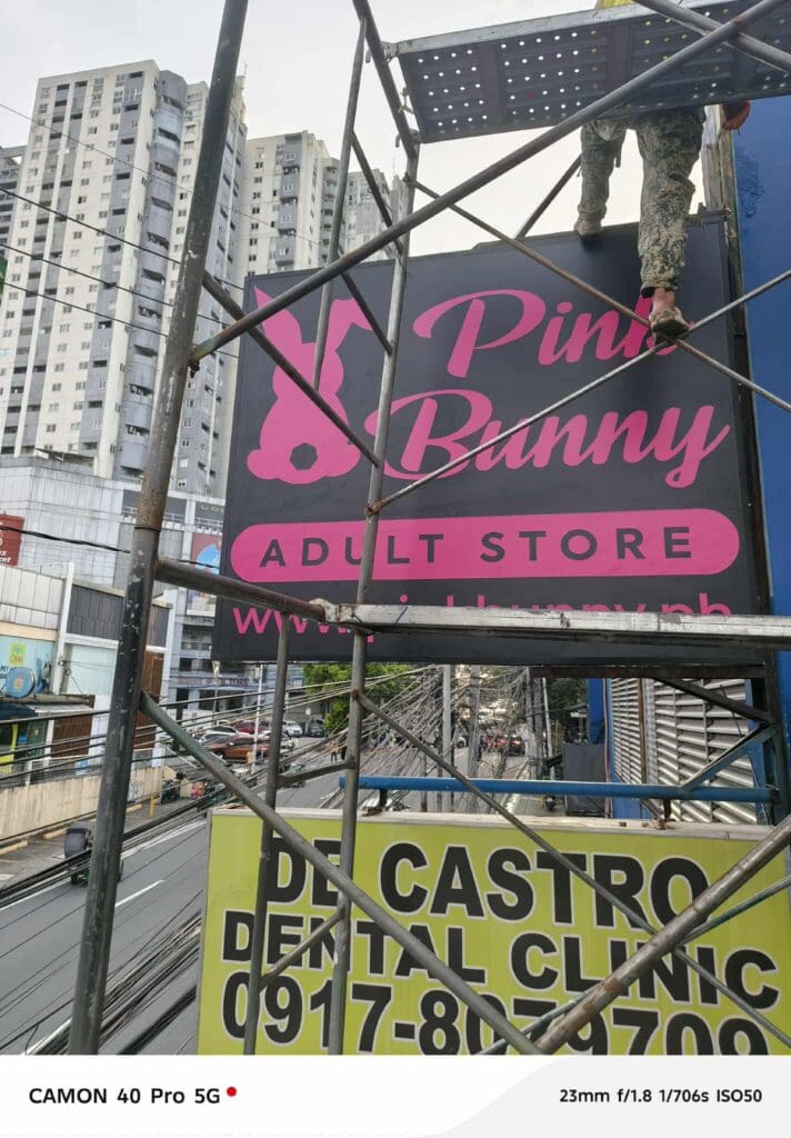 Acrylic outdoor Pink Bunny Adult Store sign and De Castro Dental Clinic sign, Metro Manila, sign maker Philippines by M&G Global Ads.