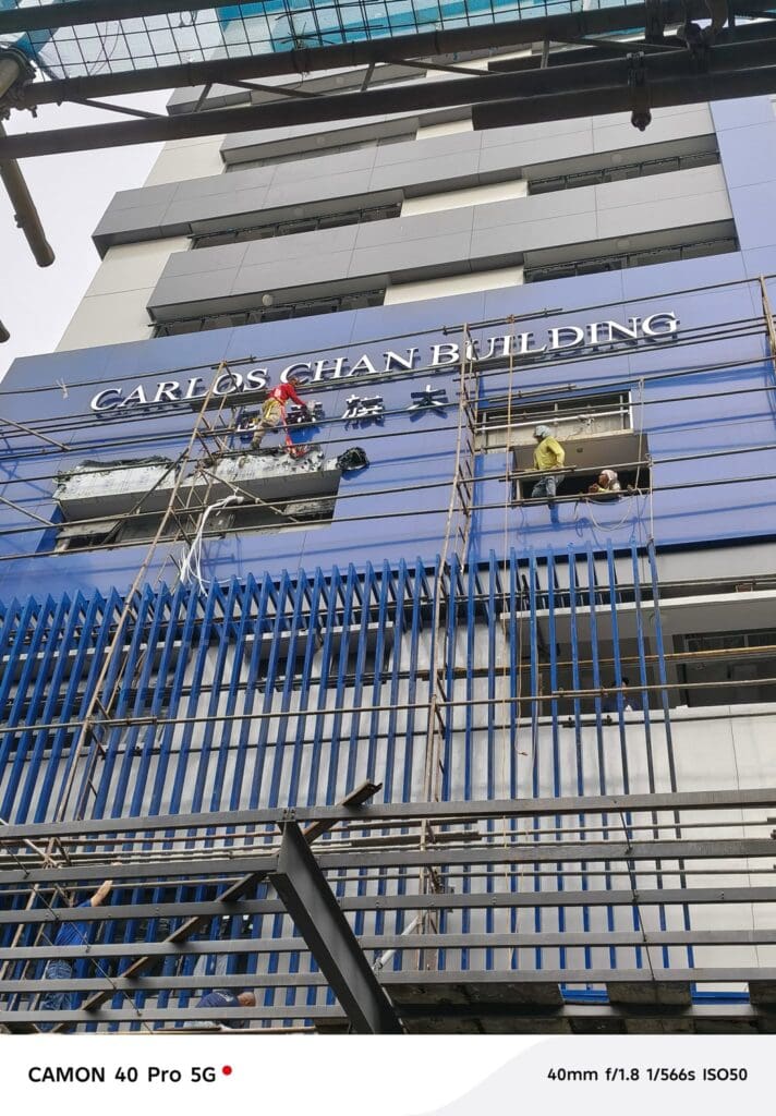 Building signage installation for CARLOS CHAN BUILDING, Metro Manila, by sign maker Philippines. By M&G Global Ads.