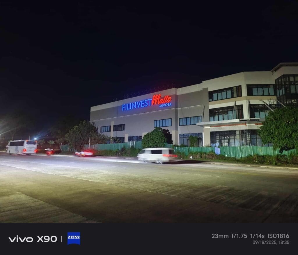 Filinvest Mall building signage, illuminated at night in Clark, by sign maker Philippines. By M&G Global Ads.