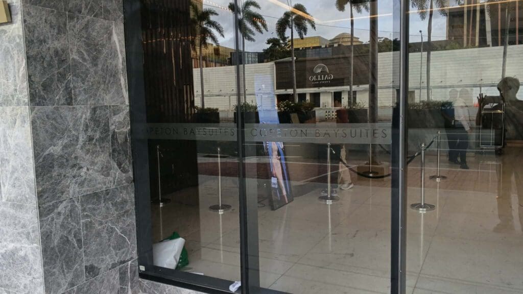 Frosted sticker glass door signage for COBESTON BAYSUITES, lobby entrance, Metro Manila, sign maker Philippines by M&G Global Ads.