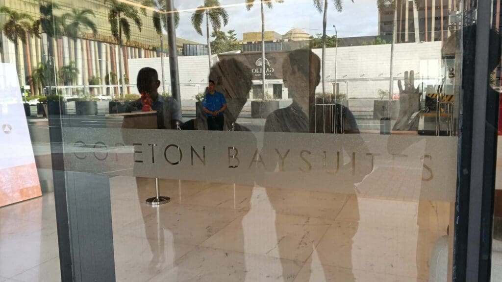 Frosted sticker glass door signage with COLETON BAYSUITES engraving, Metro Manila, sign maker Philippines by M&G Global Ads.