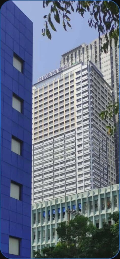 IN GOD WE TRUST acrylic building signage on tall modern high-rise, Metro Manila, sign maker Philippines by M&G Global Ads.