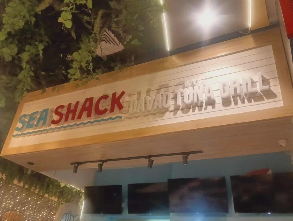 Indoor building sign for SEA SHACK Daytona Grill, colorful acrylic letters on wood in Daytona, by sign maker Philippines M&G Global Ads.