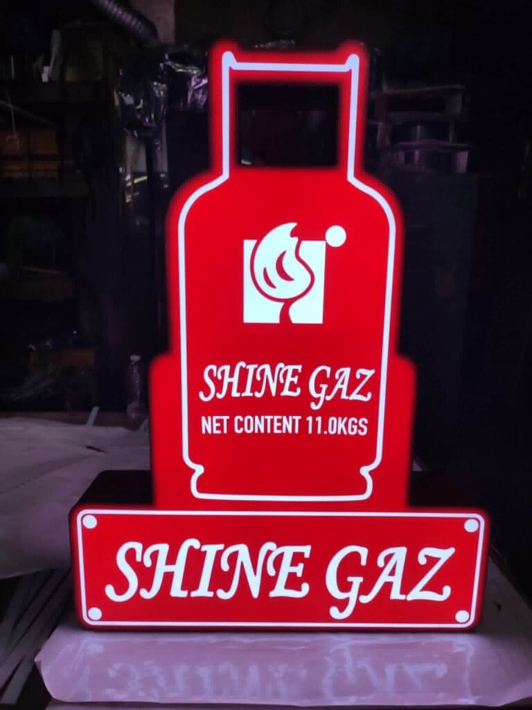 LED acrylic outdoor signage for SHINE GAZ, gas cylinder shape, illuminated with text and flame logo, sign maker Philippines by M&G Global Ads.