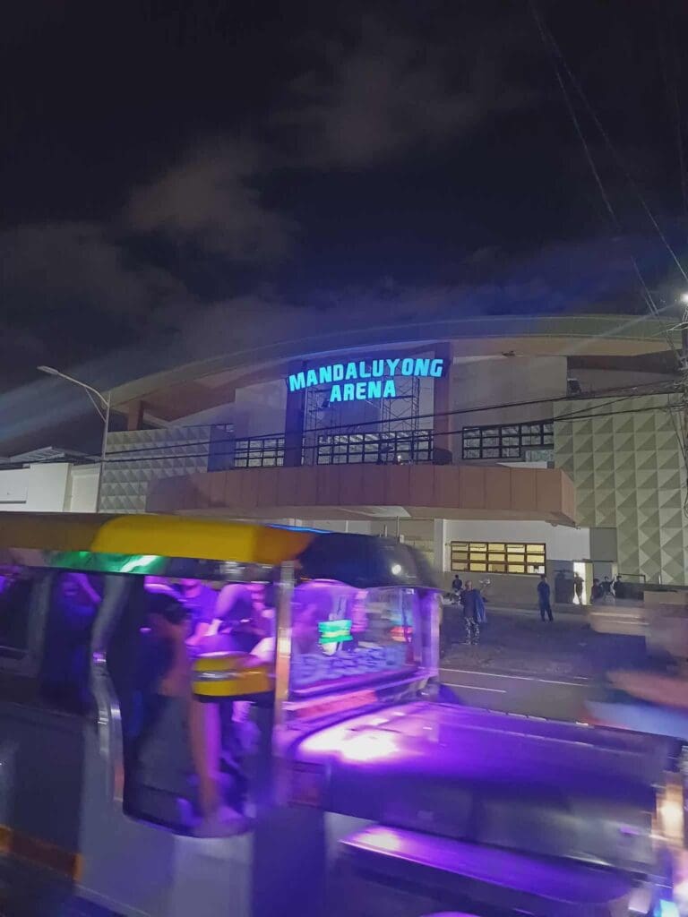 Mandaluyong Arena with neon blue LED building signage at night, Metro Manila, sign maker Philippines by M&G Global Ads.