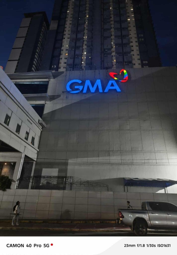 Outdoor LED building signage featuring the illuminated GMA logo in Metro Manila by sign maker Philippines, by M&G Global Ads.