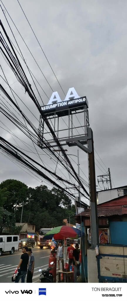 Outdoor LED pylon signage for ASSUMPTION ANTIPOLO above busy street, Antipolo, sign maker Philippines by M&G Global Ads.