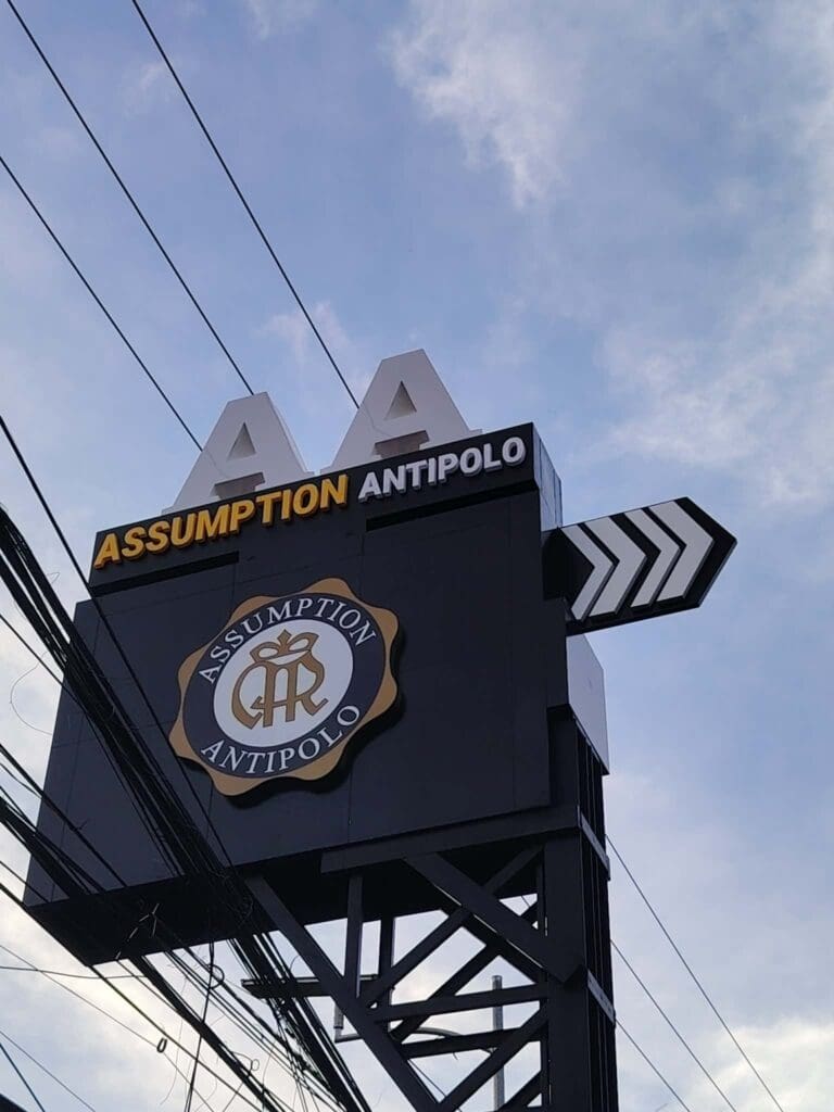Outdoor pylon signage for Assumption Antipolo in Metro Manila with acrylic letters by sign maker Philippines, by M&G Global Ads.