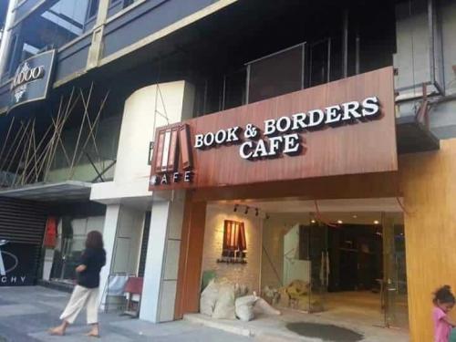 book and boarders cafe - acrylic sign - building signage