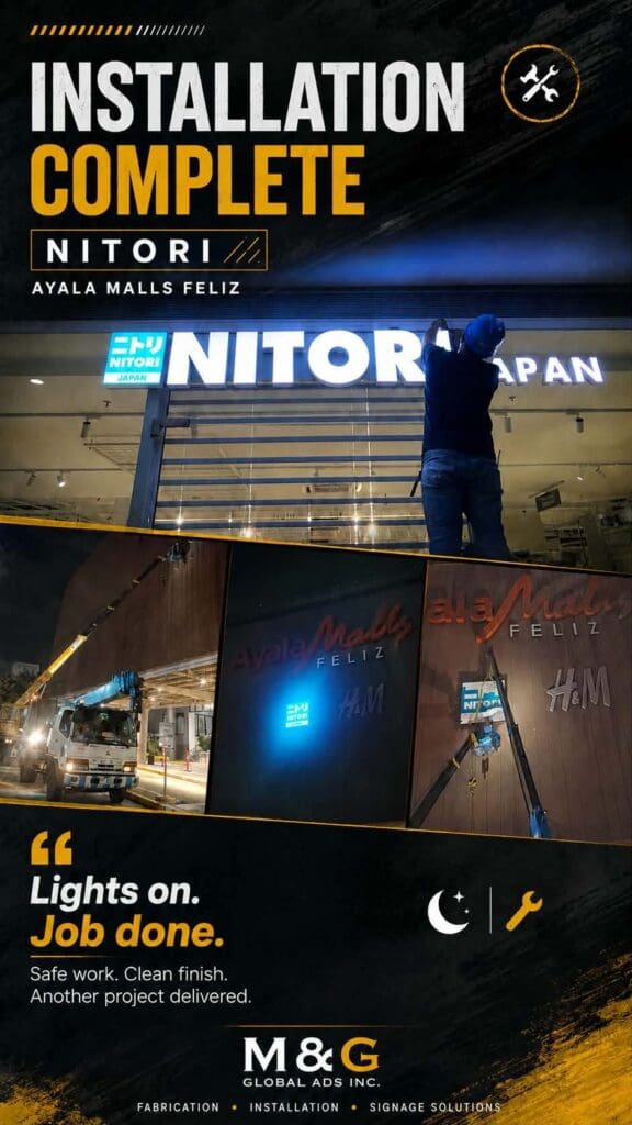 Workers install illuminated acrylic LED building signage for NITORI JAPAN at Ayala Malls Feliz, with the completed glowing sign above the entrance at night. Sign maker Philippines by M&G Global Ads.