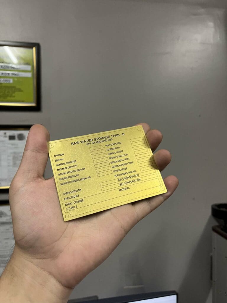 Stainless steel engraved signage for raw water storage tank info, Metro Manila. Sign maker Philippines by M&G Global Ads.