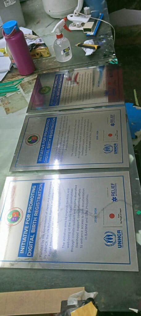 Stainless steel plaques signage for UNHCR and Relief International, Philippines, by sign maker Philippines M&G Global Ads.